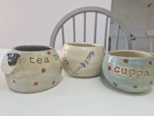 Click Here To Enlarge This Photo Of Assorted Used Tea Bag Pots